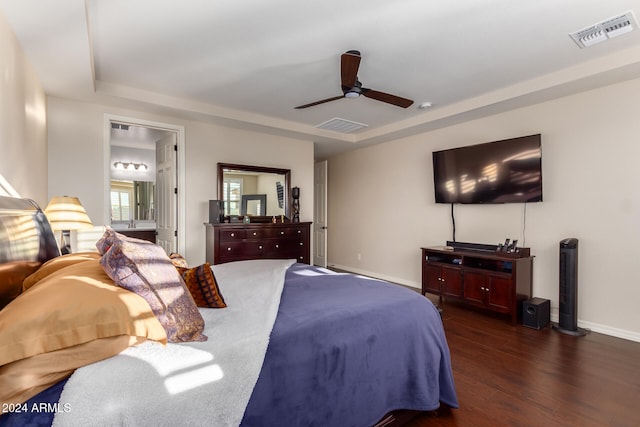 bedroom featuring ceiling fan and dark wood-type flooring