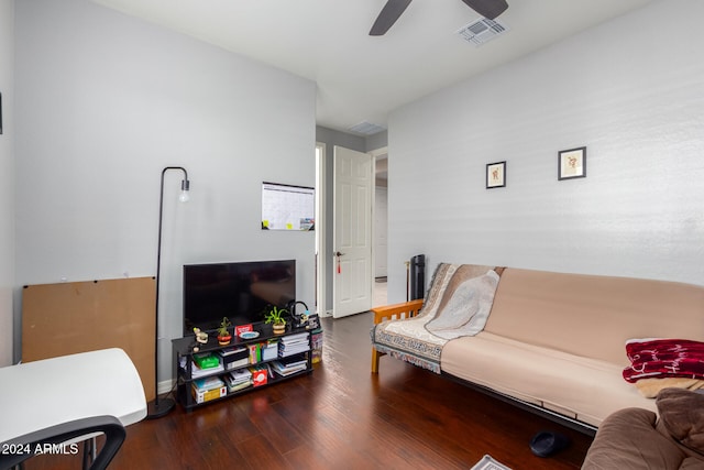 living room with ceiling fan and wood-type flooring