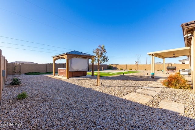 view of yard featuring a gazebo and a patio