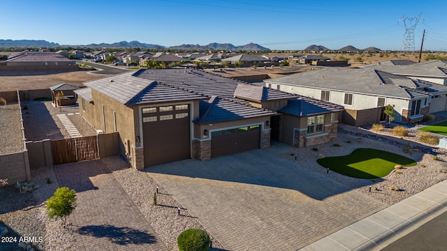 drone / aerial view featuring a mountain view