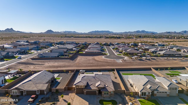 birds eye view of property featuring a mountain view