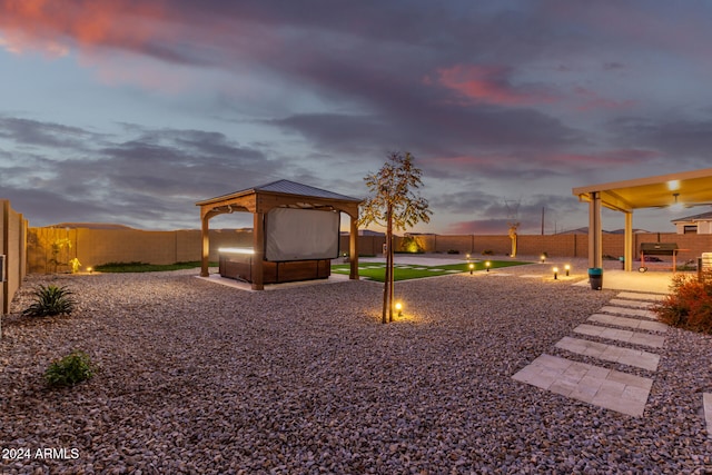 playground at dusk with a gazebo