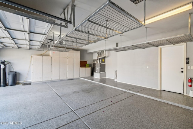 1801 W Nighthawk Way, Phoenix, AZ 85045 - garage with baseboards and heating unit