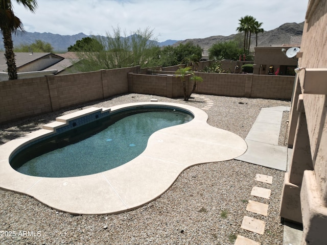 1801 W Nighthawk Way, Phoenix, AZ 85045 - view of swimming pool with a mountain view and a fenced backyard