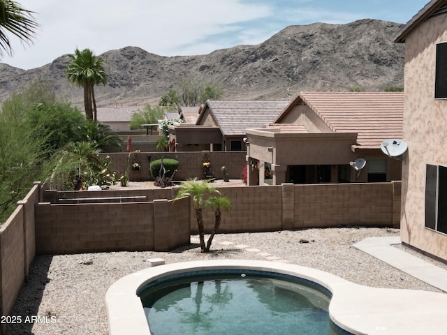 1801 W Nighthawk Way, Phoenix, AZ 85045 - view of swimming pool with a fenced backyard and a mountain view