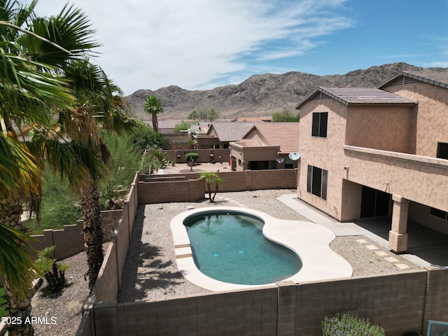 1801 W Nighthawk Way, Phoenix, AZ 85045 - view of swimming pool with a patio area, a mountain view, and a fenced backyard