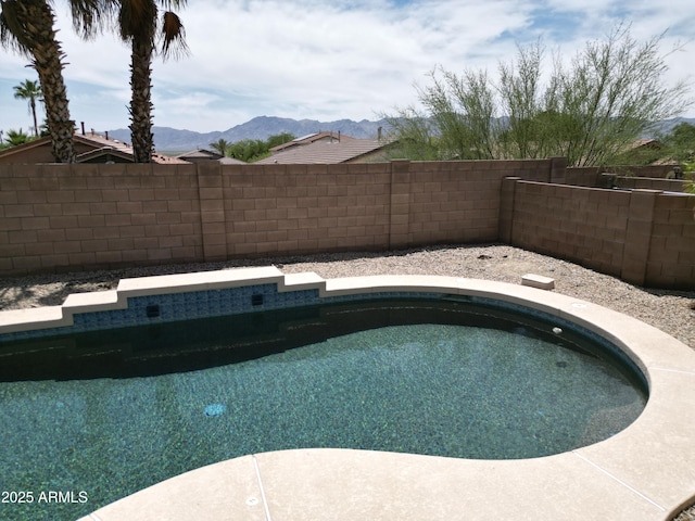 1801 W Nighthawk Way, Phoenix, AZ 85045 - view of swimming pool featuring a fenced backyard and a mountain view