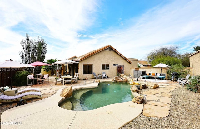 view of swimming pool with a patio area, a fenced in pool, and a fenced backyard