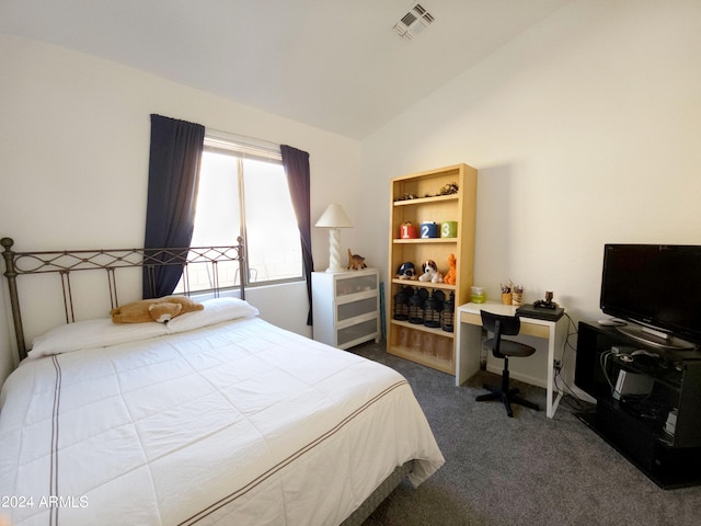 bedroom featuring carpet floors and lofted ceiling