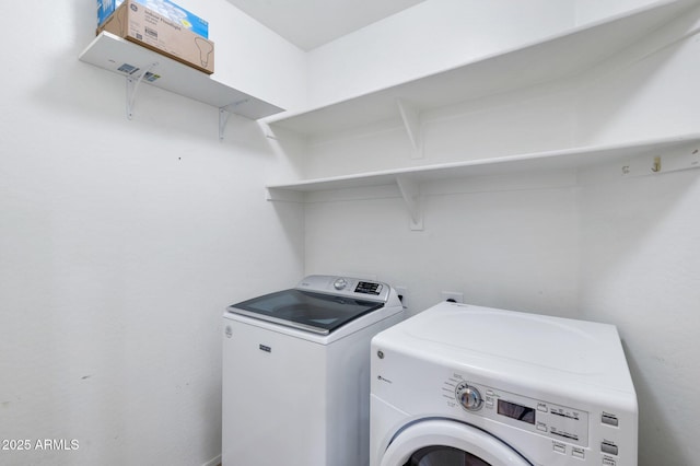 11669 N 165th Ave, Surprise, AZ 85388 - laundry area featuring washer and clothes dryer and laundry area