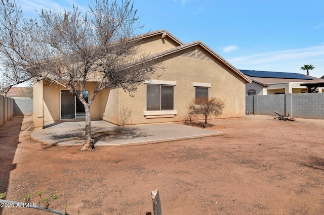 11669 N 165th Ave, Surprise, AZ 85388 - rear view of property featuring a patio, a fenced backyard, and stucco siding
