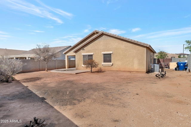 11669 N 165th Ave, Surprise, AZ 85388 - rear view of property featuring a patio, cooling unit, a fenced backyard, and stucco siding