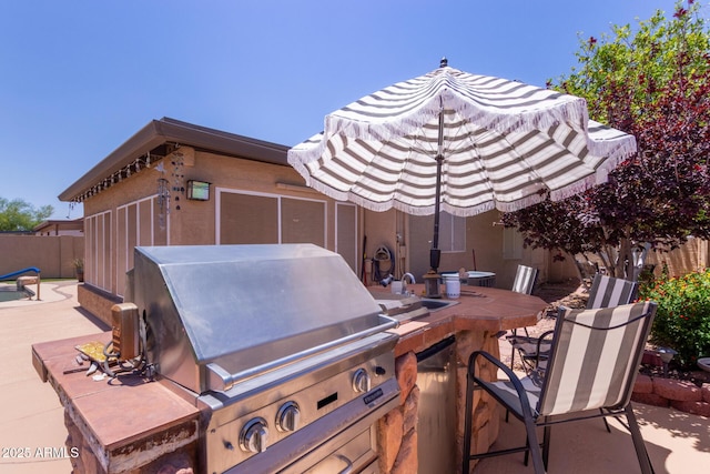 20769 N 106th Ln, Peoria, AZ 85382 - view of patio / terrace with a grill and outdoor dining space