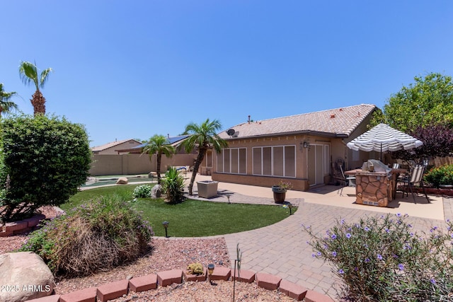 20769 N 106th Ln, Peoria, AZ 85382 - fenced backyard with a patio