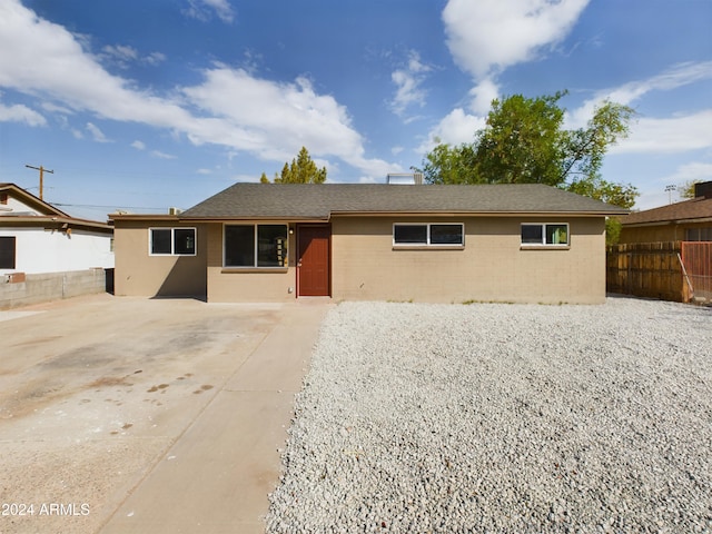 ranch-style home with a patio area