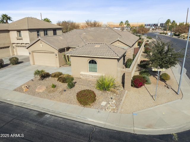 view of front of property with a garage