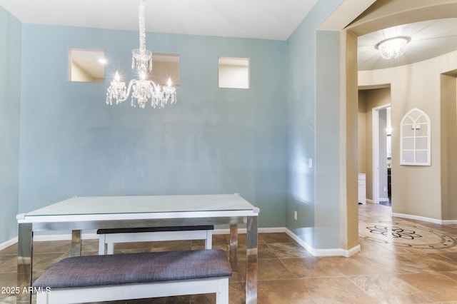 dining area with a chandelier