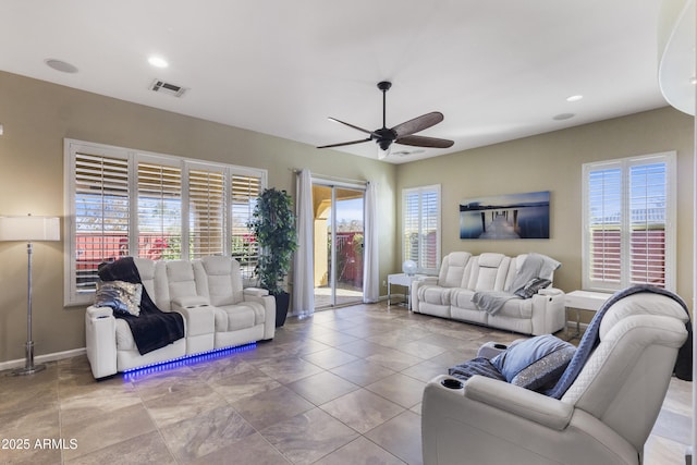 living room with ceiling fan