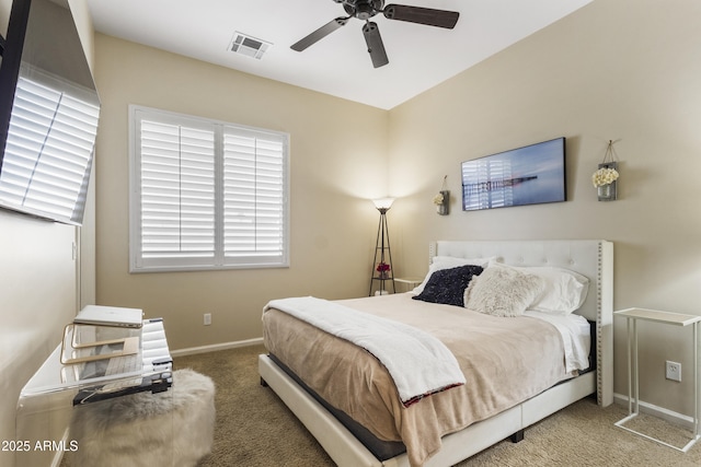 bedroom with ceiling fan and carpet flooring