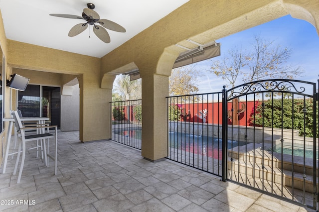 view of patio / terrace with ceiling fan