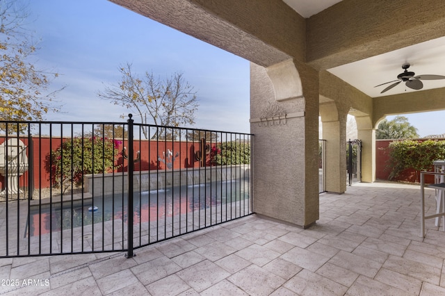 view of patio / terrace with ceiling fan