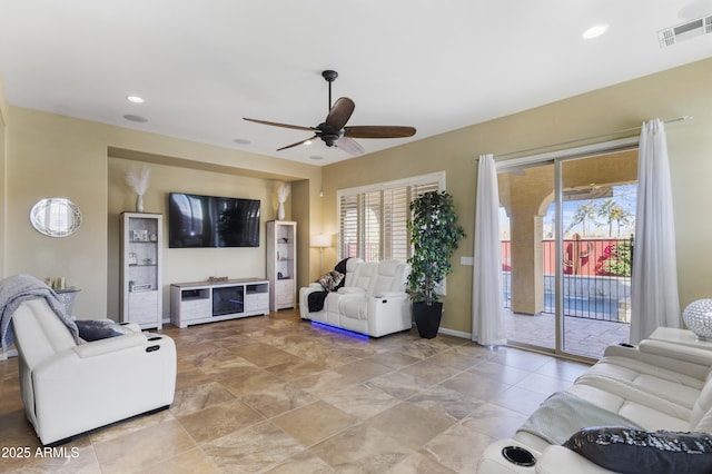 living room with ceiling fan