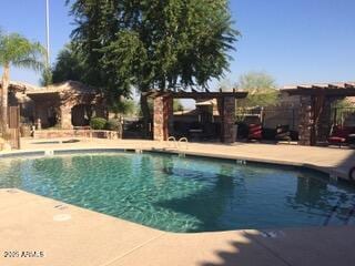 pool featuring a patio area