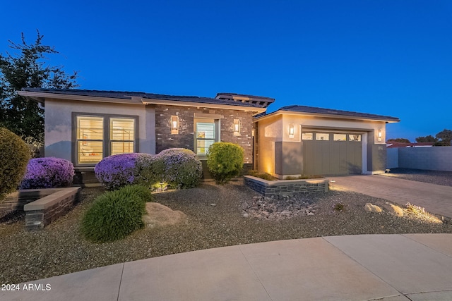 prairie-style home with a garage