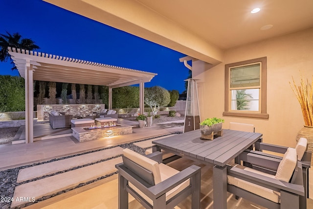 patio at twilight with a fire pit