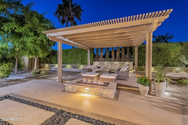 patio at twilight featuring an outdoor living space with a fire pit and a pergola