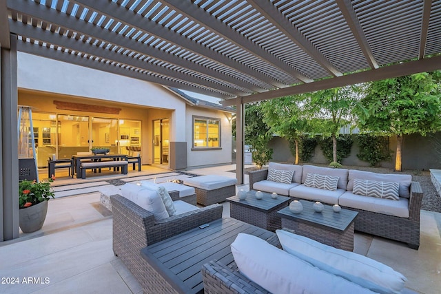 view of patio featuring outdoor lounge area and a pergola