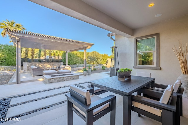 view of patio featuring an outdoor living space with a fire pit and a pergola