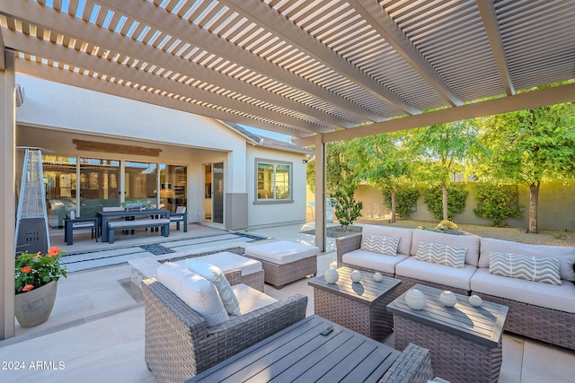 view of patio with outdoor lounge area and a pergola