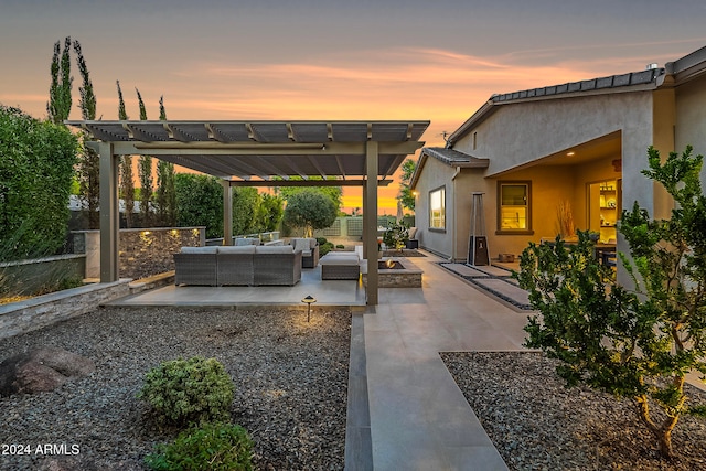 patio terrace at dusk featuring an outdoor living space and a pergola