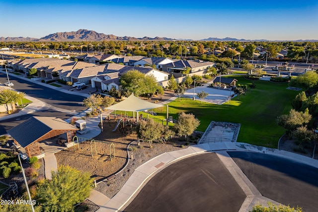 birds eye view of property with a mountain view