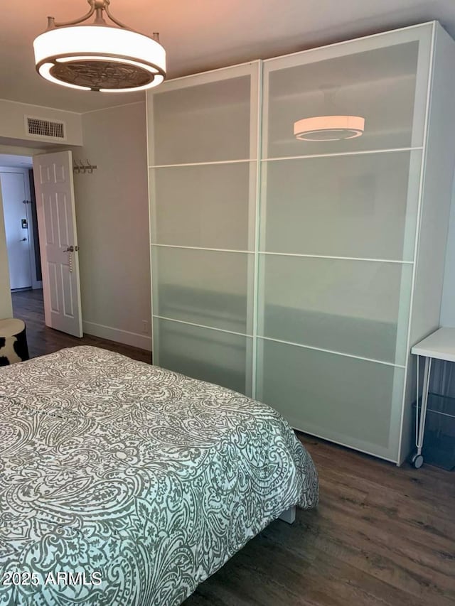 4610 N 68th St N Unit 476, Scottsdale, AZ 85251 - bedroom with wood finished floors