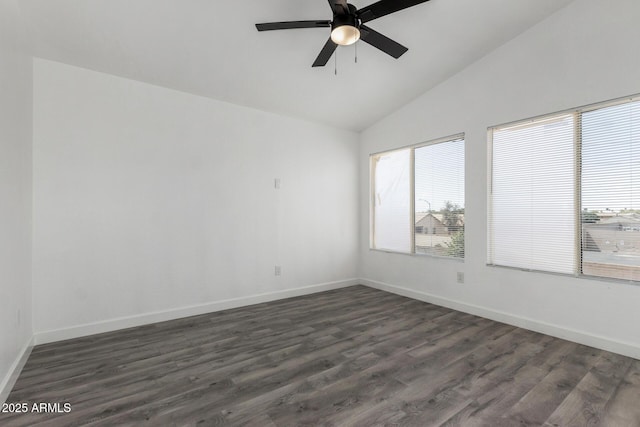 unfurnished room with a wealth of natural light, vaulted ceiling, a ceiling fan, and dark wood-style floors