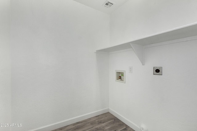 laundry area with washer hookup, wood finished floors, hookup for an electric dryer, laundry area, and visible vents