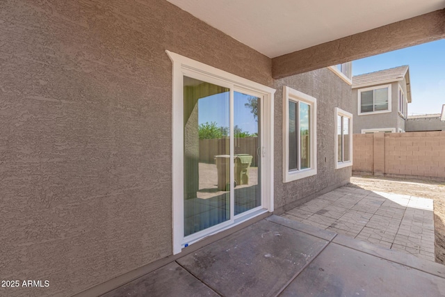 view of patio with fence