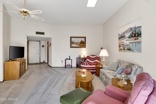 living room featuring ceiling fan and light colored carpet