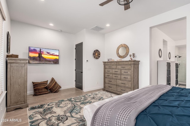 bedroom featuring ceiling fan and light hardwood / wood-style floors