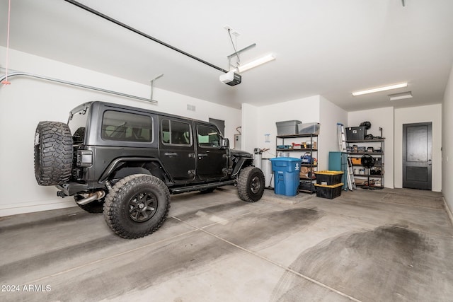 garage featuring a garage door opener