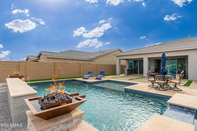 view of pool with a patio area