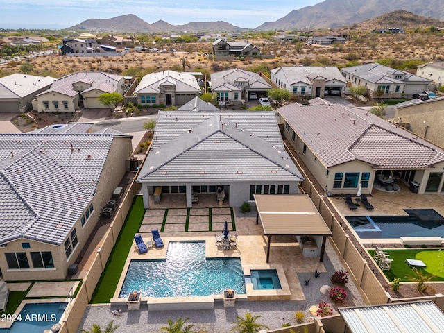 view of swimming pool featuring a mountain view