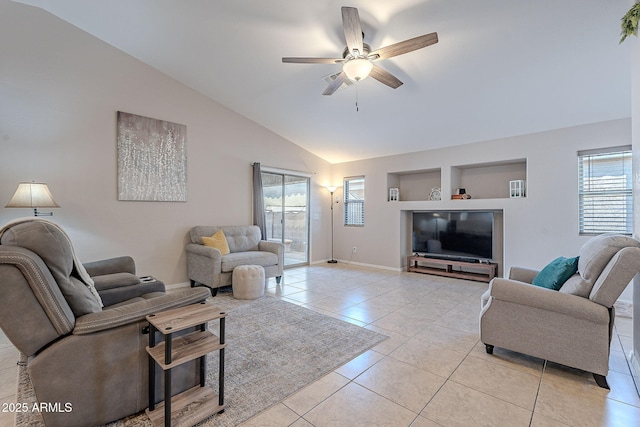 living room featuring light tile patterned flooring, high vaulted ceiling, ceiling fan, and built in shelves