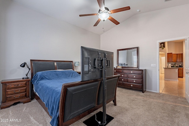 bedroom with lofted ceiling, light carpet, and ceiling fan