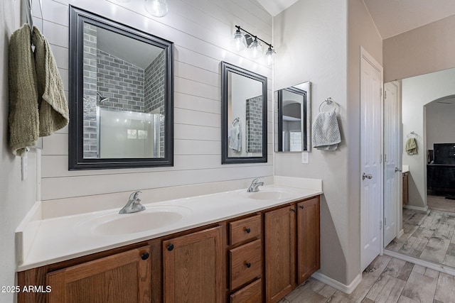 bathroom with vanity and hardwood / wood-style flooring