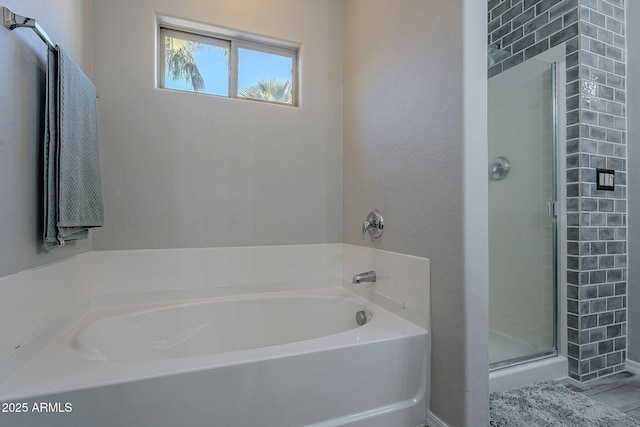 bathroom featuring plus walk in shower