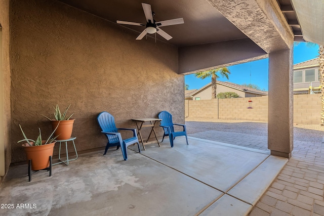 view of patio / terrace featuring ceiling fan