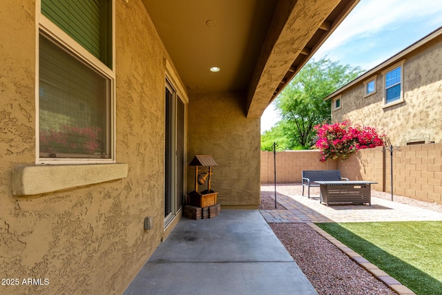 view of patio with fence